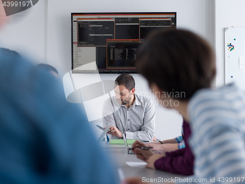 Image of Business Team At A Meeting at modern office building