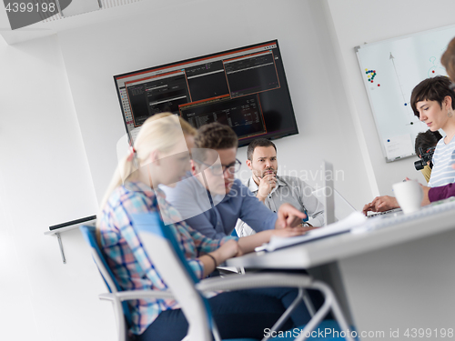 Image of Business Team At A Meeting at modern office building