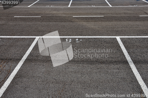 Image of dividing lines asphalt paved parking lot