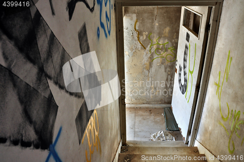 Image of staircase arrow in abandoned house