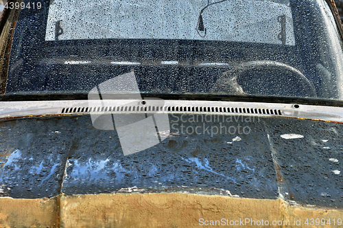 Image of vintage car scraped hood