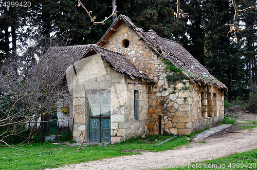 Image of old house in the woods