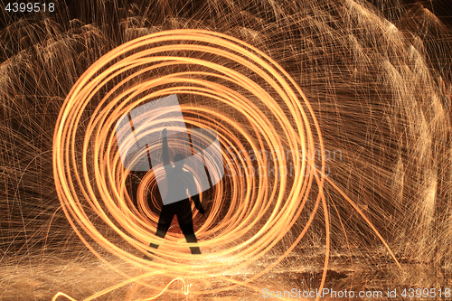 Image of Unique Creative Light Painting With Fire and Tube Lighting