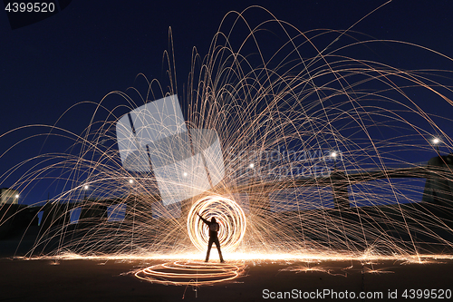 Image of Unique Creative Light Painting With Fire and Tube Lighting