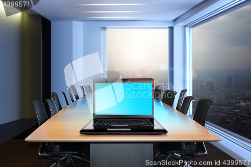 Image of black laptop on a table