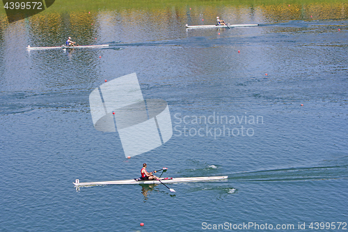 Image of Rowers in a rowing boat on the race