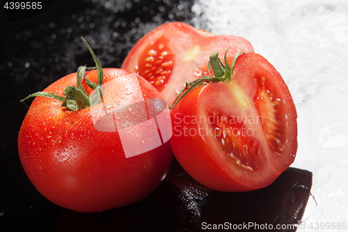 Image of Tomatoes On A Glass Background