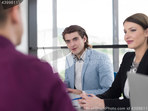 Image of Business Team At A Meeting at modern office building