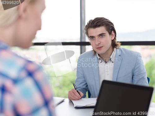 Image of Business Team At A Meeting at modern office building