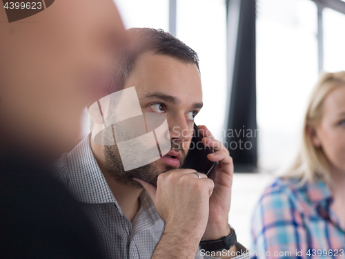 Image of Business Team At A Meeting at modern office building