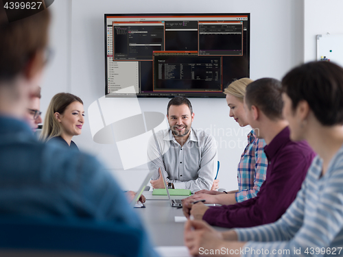 Image of Business Team At A Meeting at modern office building