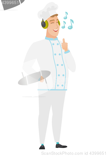Image of Chef cook listening to music in headphones.