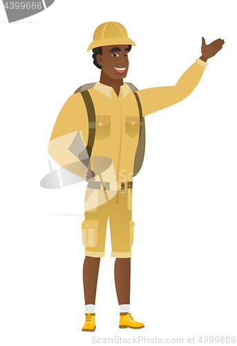 Image of African-american traveler showing a direction.