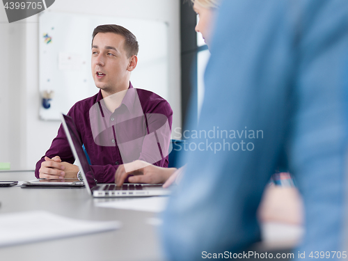 Image of Business Team At A Meeting at modern office building