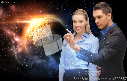 Image of businessman and businesswoman over space