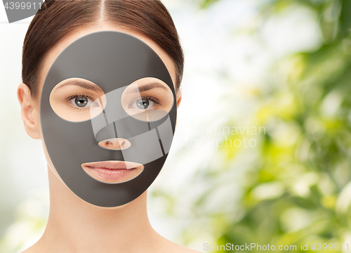 Image of beautiful young woman with hydrogel mask on face
