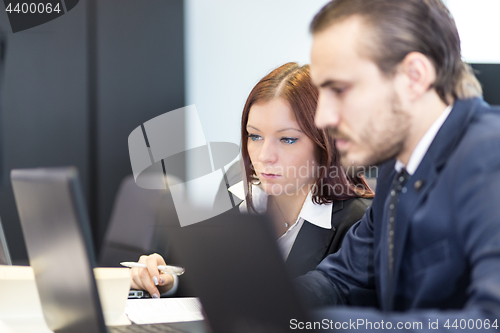 Image of Business people in modern office.