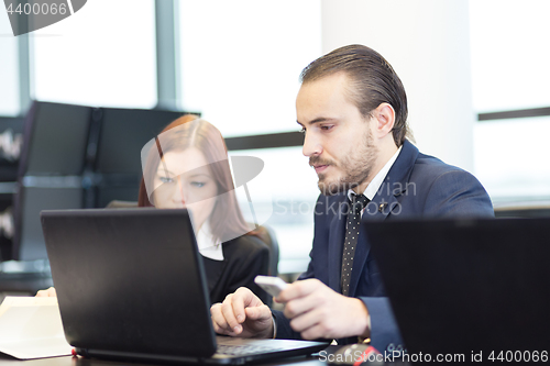 Image of Business people in modern office.