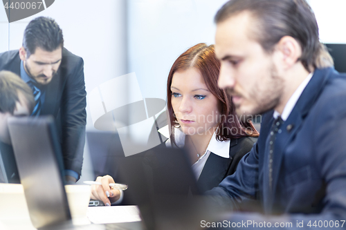 Image of Business people in modern office.