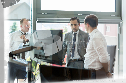 Image of Corporate businessteam working in modern office.