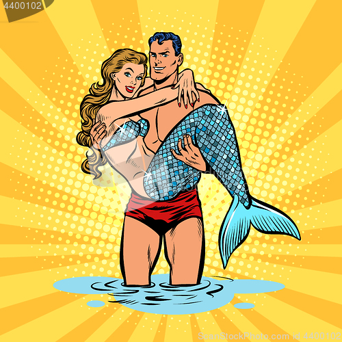 Image of Couple in love. Mermaid and handsome male swimmer