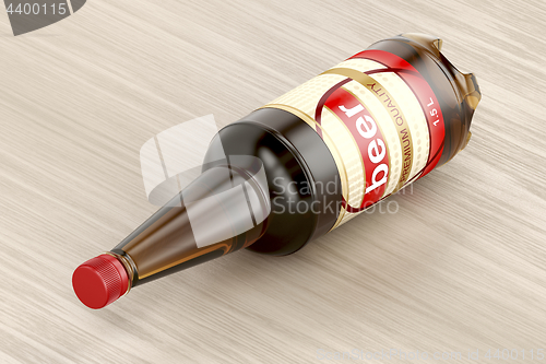 Image of Beer bottle on wood background