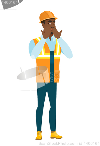 Image of Shoked african-american builder covering his mouth