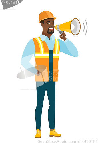 Image of African-american builder talking into loudspeaker.