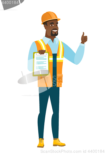 Image of Builder with clipboard giving thumb up.