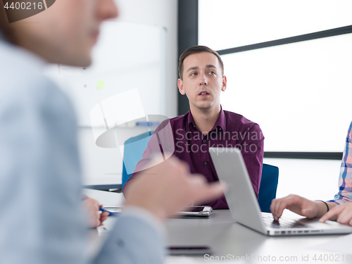 Image of Business Team At A Meeting at modern office building