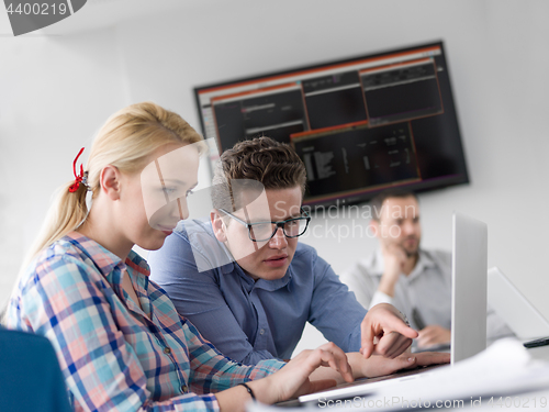 Image of Business Team At A Meeting at modern office building