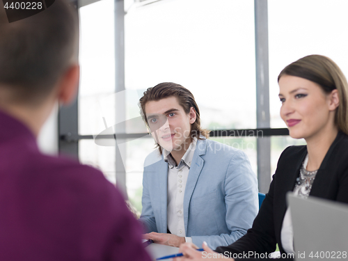 Image of Business Team At A Meeting at modern office building
