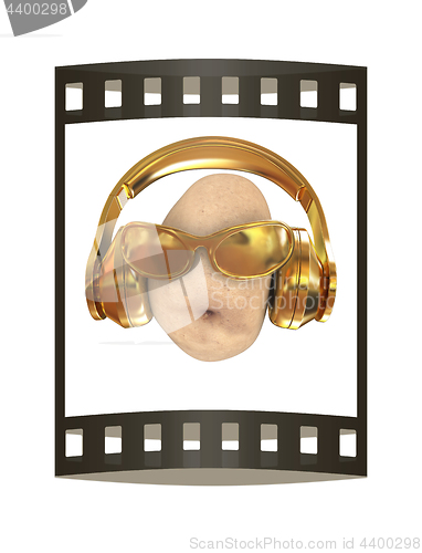 Image of potato with sun glass and headphones front \"face\" on a white bac