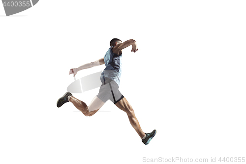 Image of The studio shot of high jump athlete is in action