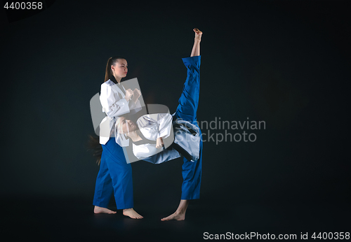 Image of The karate girl with black belt