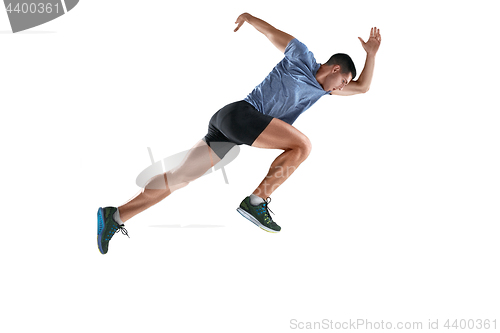 Image of The studio shot of high jump athlete is in action