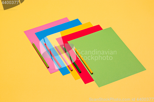 Image of colored pencils and colour paper