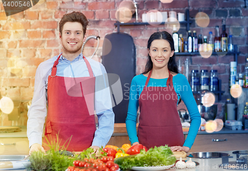 Image of happy couple in kitchen at cooking class