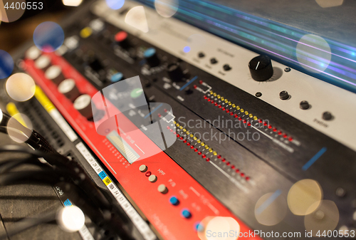 Image of close up of music mixing console