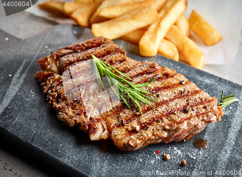 Image of grilled beef steak and potatoes