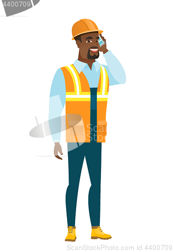 Image of Builder talking on a mobile phone.