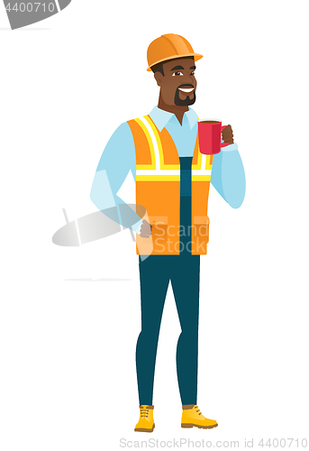Image of African-american builder holding cup of coffee.