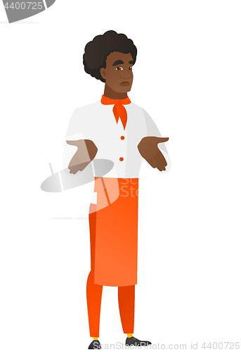 Image of African confused chef cook shrugging shoulders.