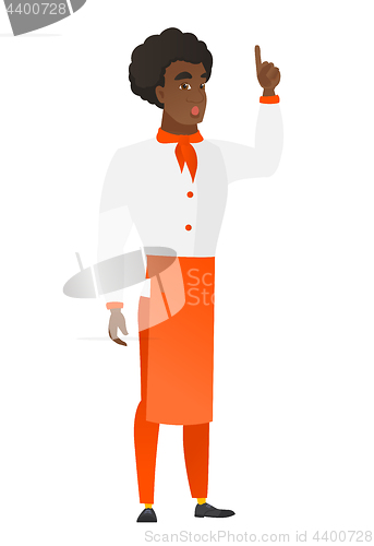 Image of Chef cook with open mouth pointing finger up.