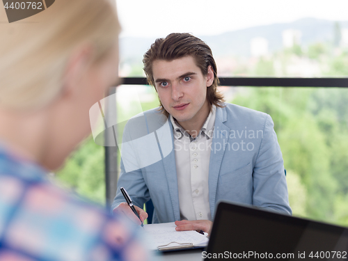 Image of Business Team At A Meeting at modern office building