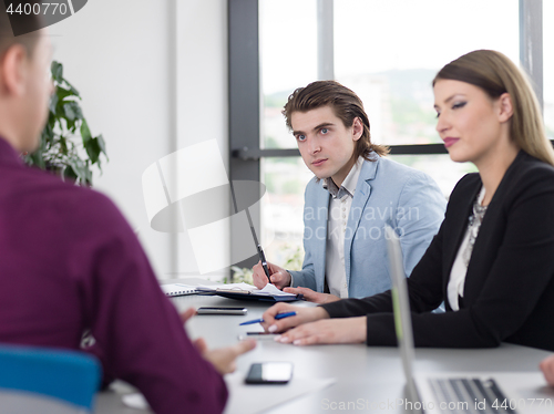 Image of Business Team At A Meeting at modern office building