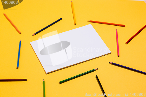 Image of colored pencils and colour paper