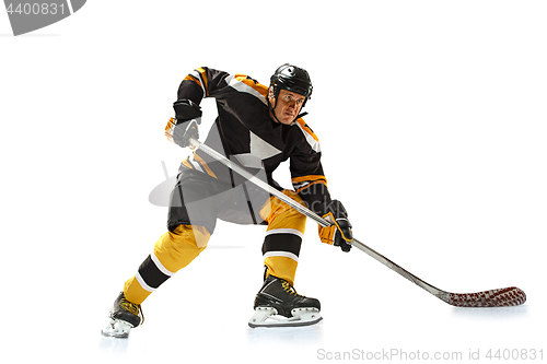 Image of one caucasian man hockey player in studio silhouette isolated on white background