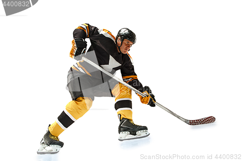 Image of one caucasian man hockey player in studio silhouette isolated on white background