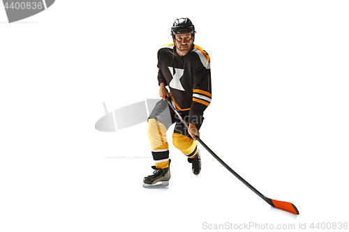 Image of one caucasian man hockey player in studio silhouette isolated on white background